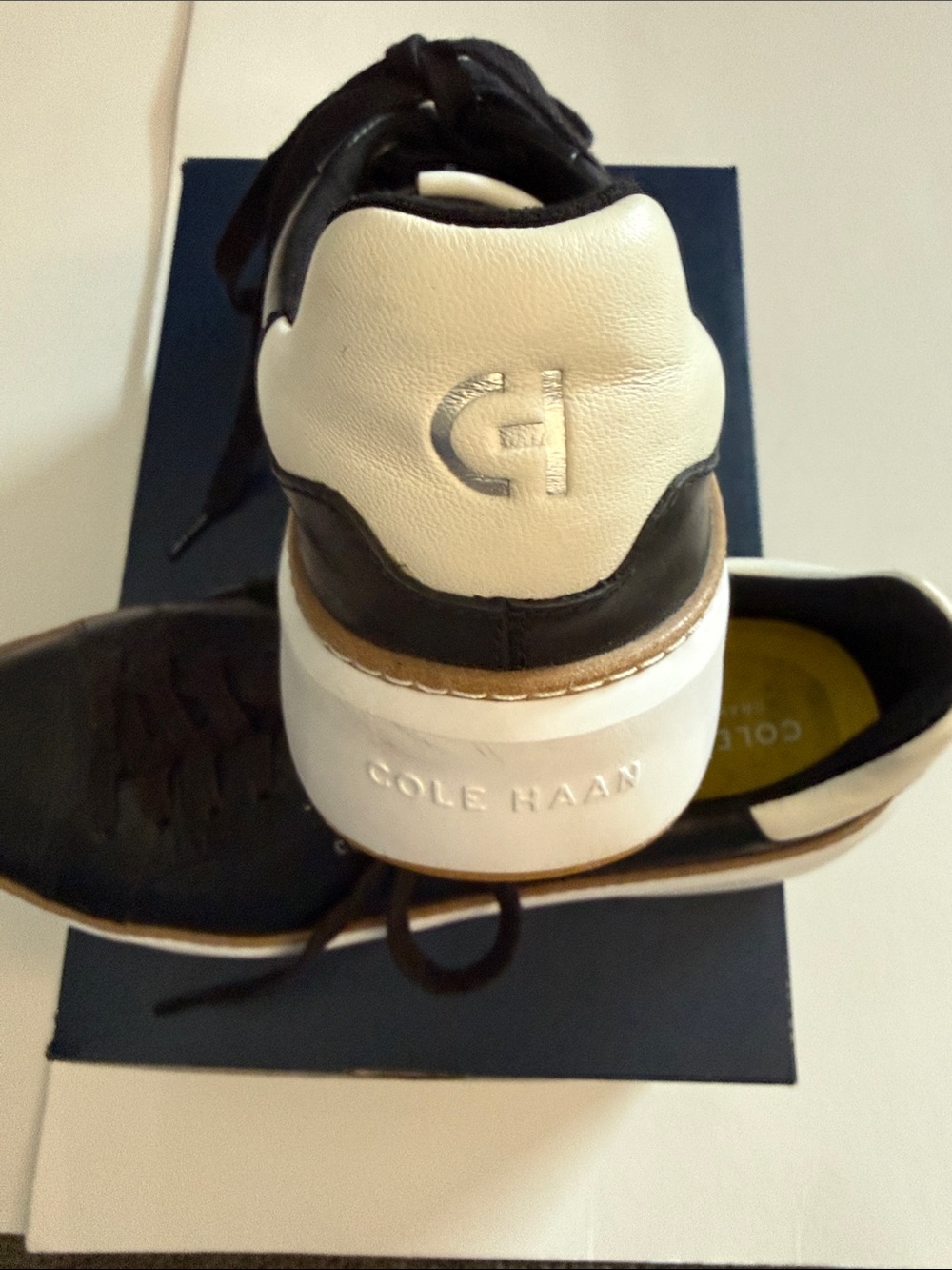 COLE HANN GP TOPSPIN BLACK AND WHITE WOMEN’S LEATHER SNEAKER, 9